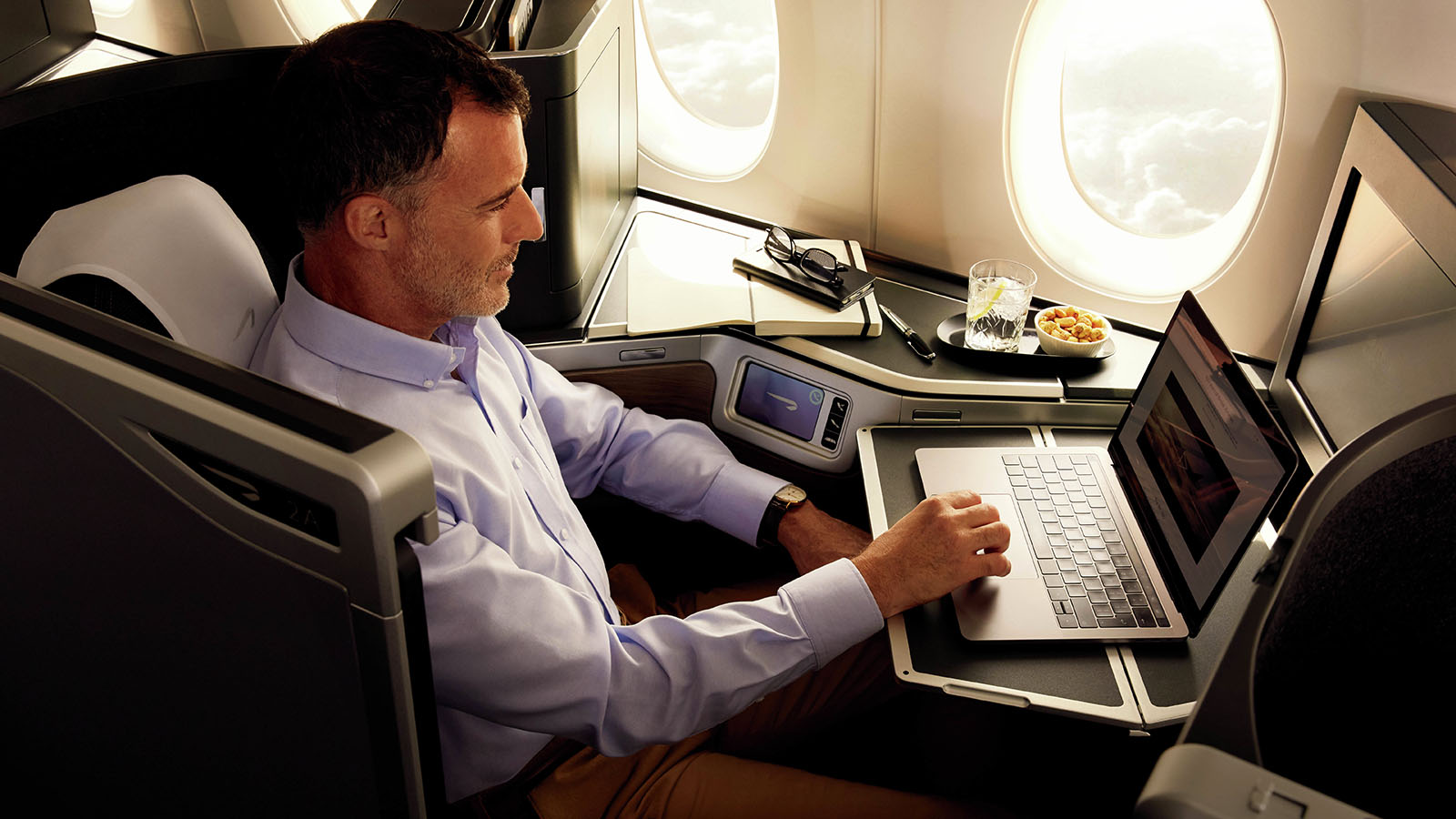 Traveller in British Airways Club Suite Business Class