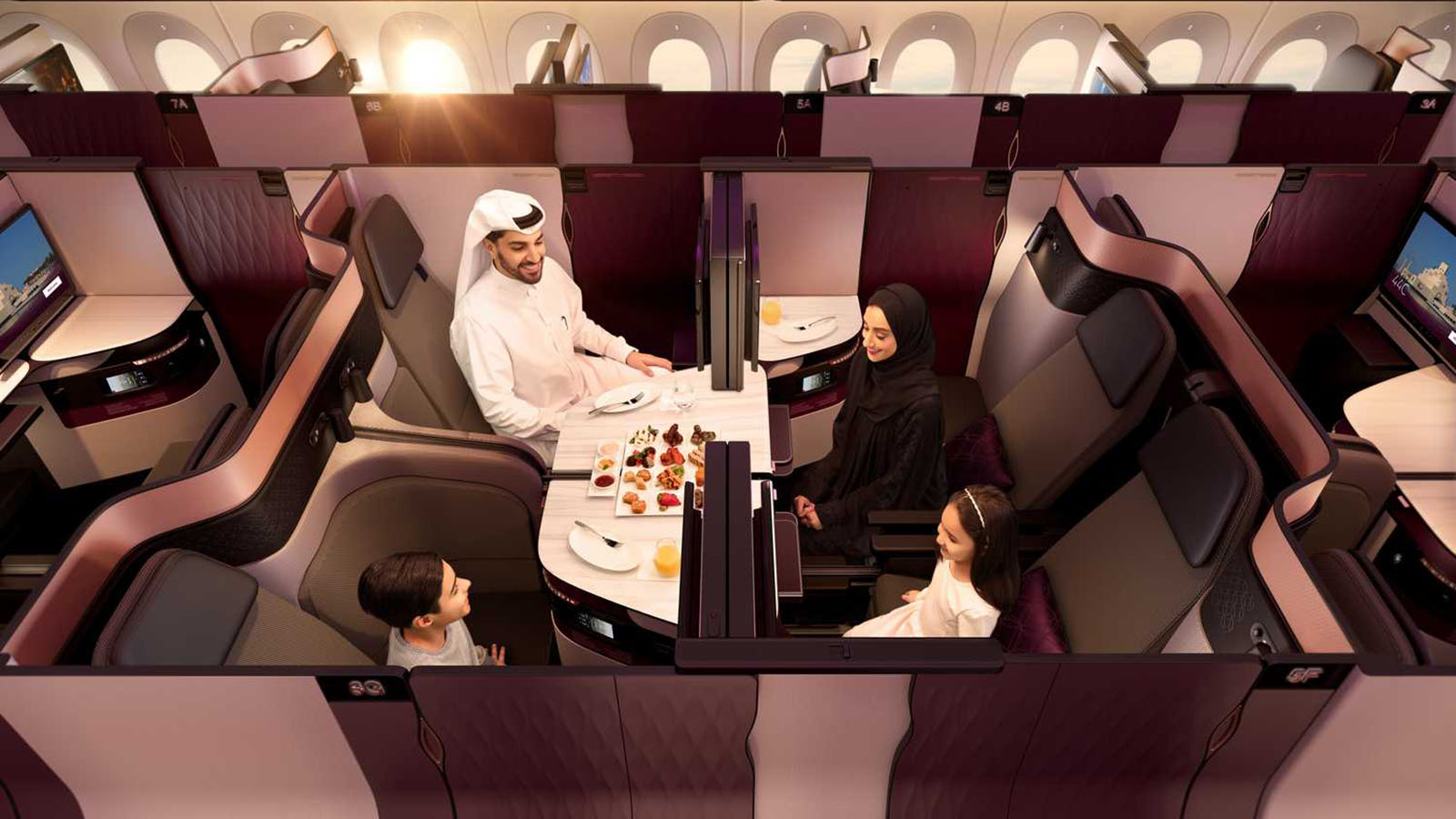 Group travelling in Qatar Airways Qsuite Business Class