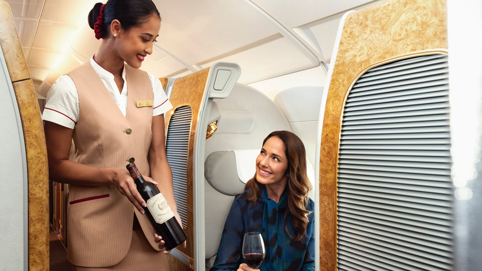 Wine pouring in Emirates First Class