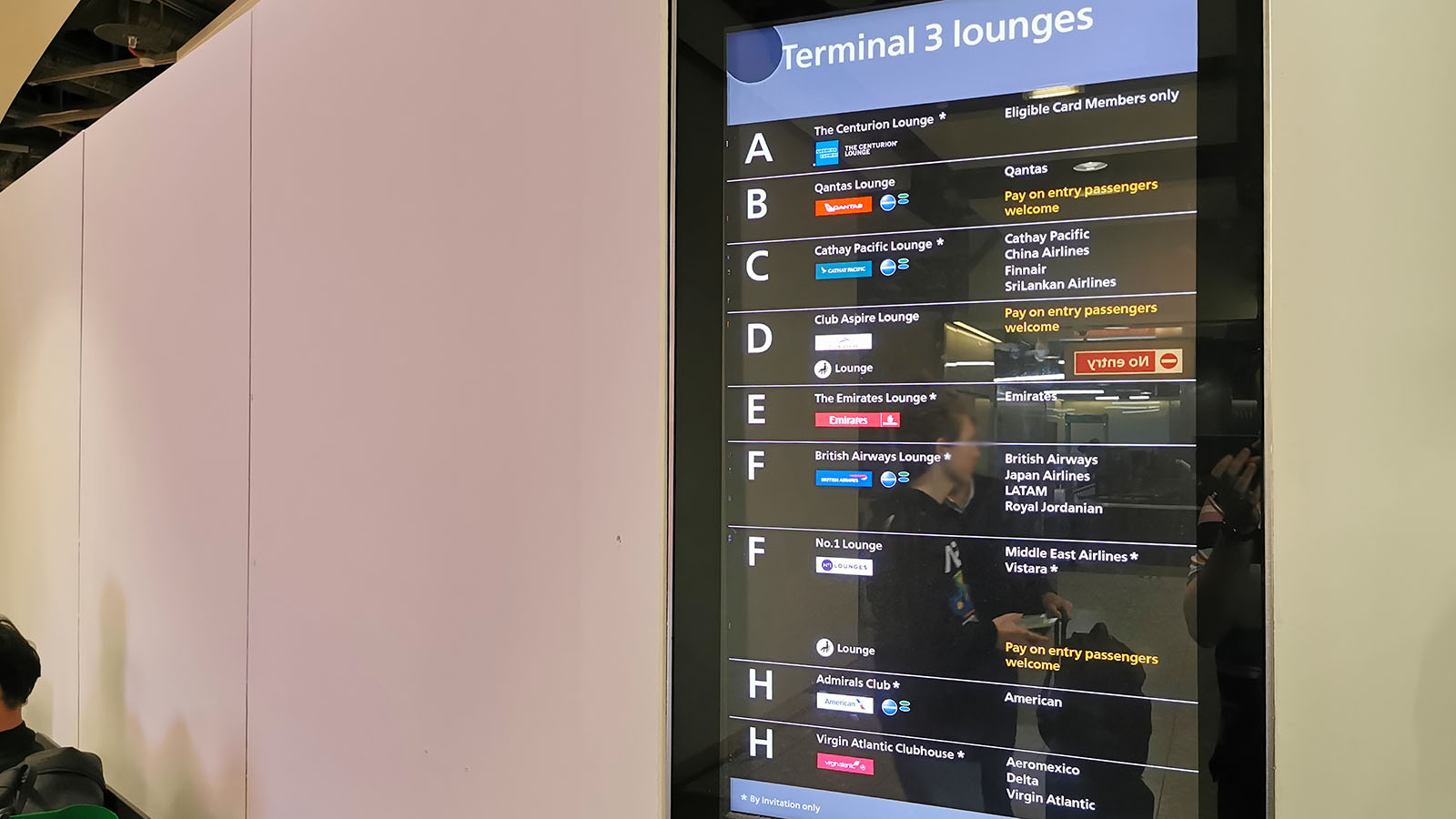 TV screen with lounge locations at Heathrow