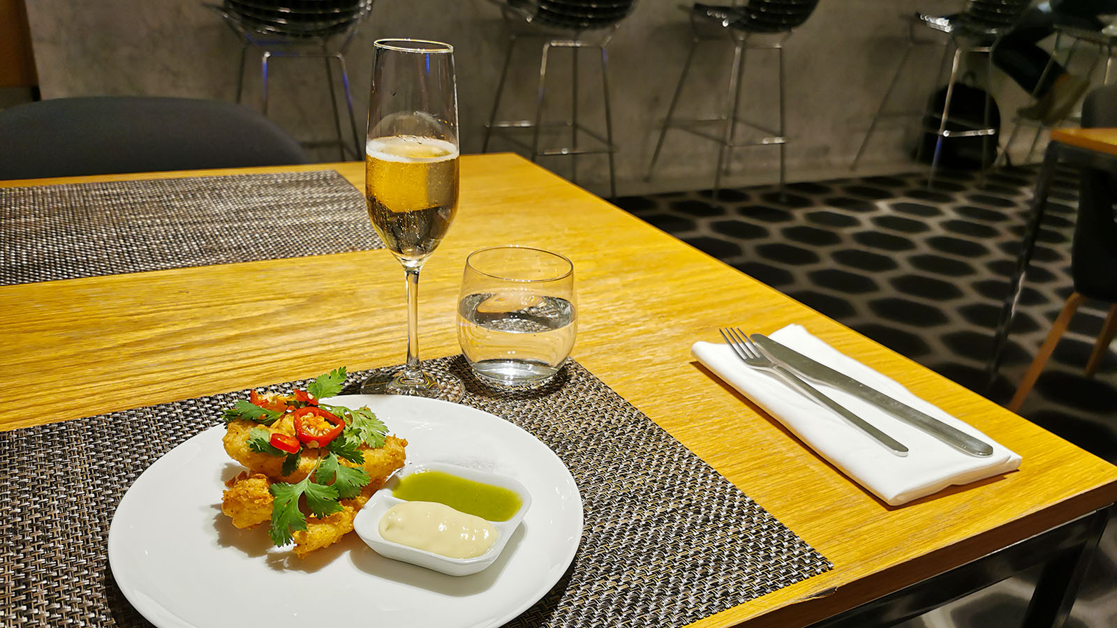 Squid and Champagne in the Qantas Los Angeles International First Lounge