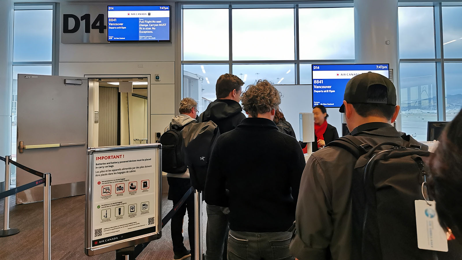 Queue to get aboard Air Canada Bombardier CRJ900 Business Class