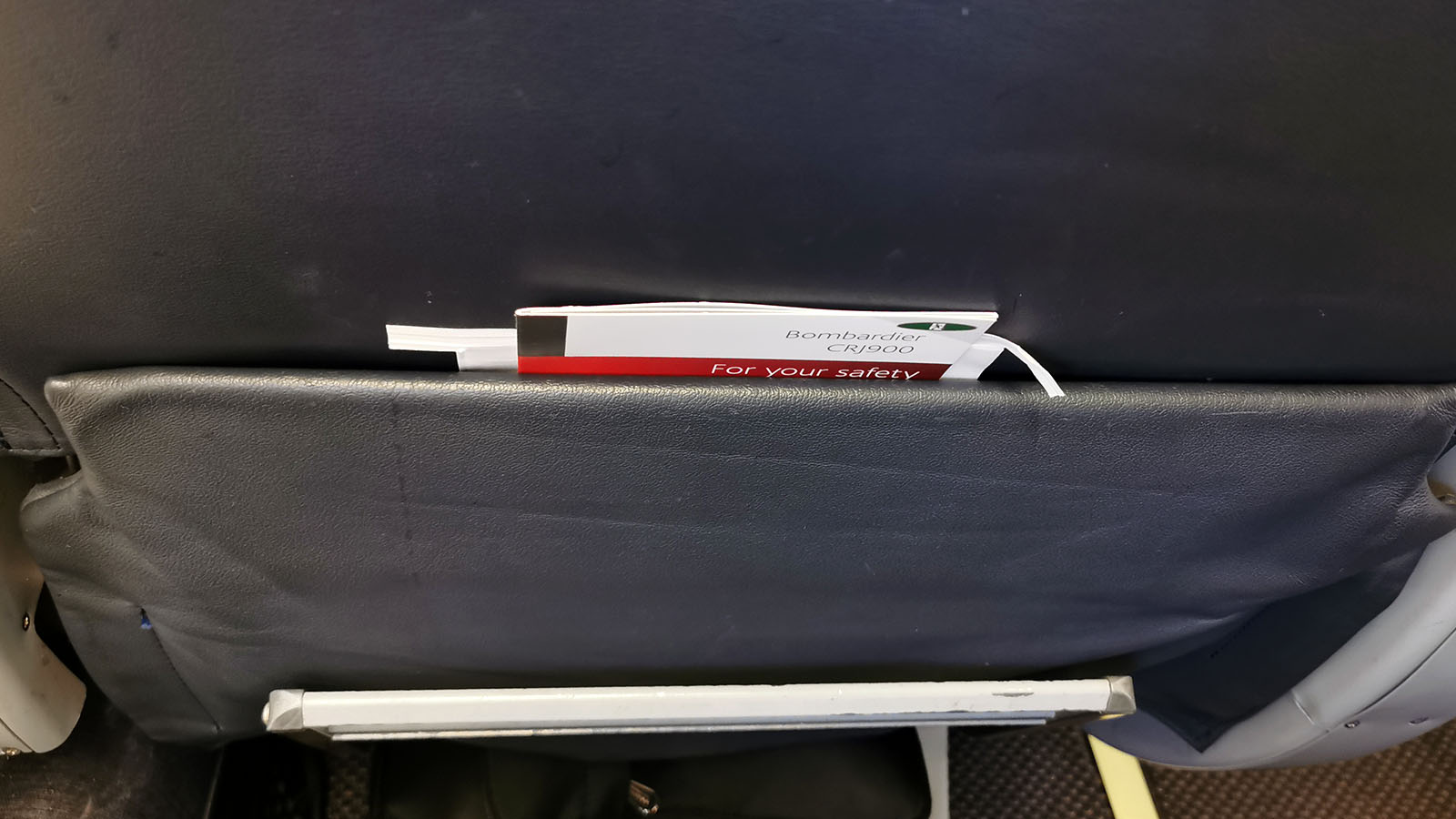 Seatback pocket in Air Canada Bombardier CRJ900 Business Class