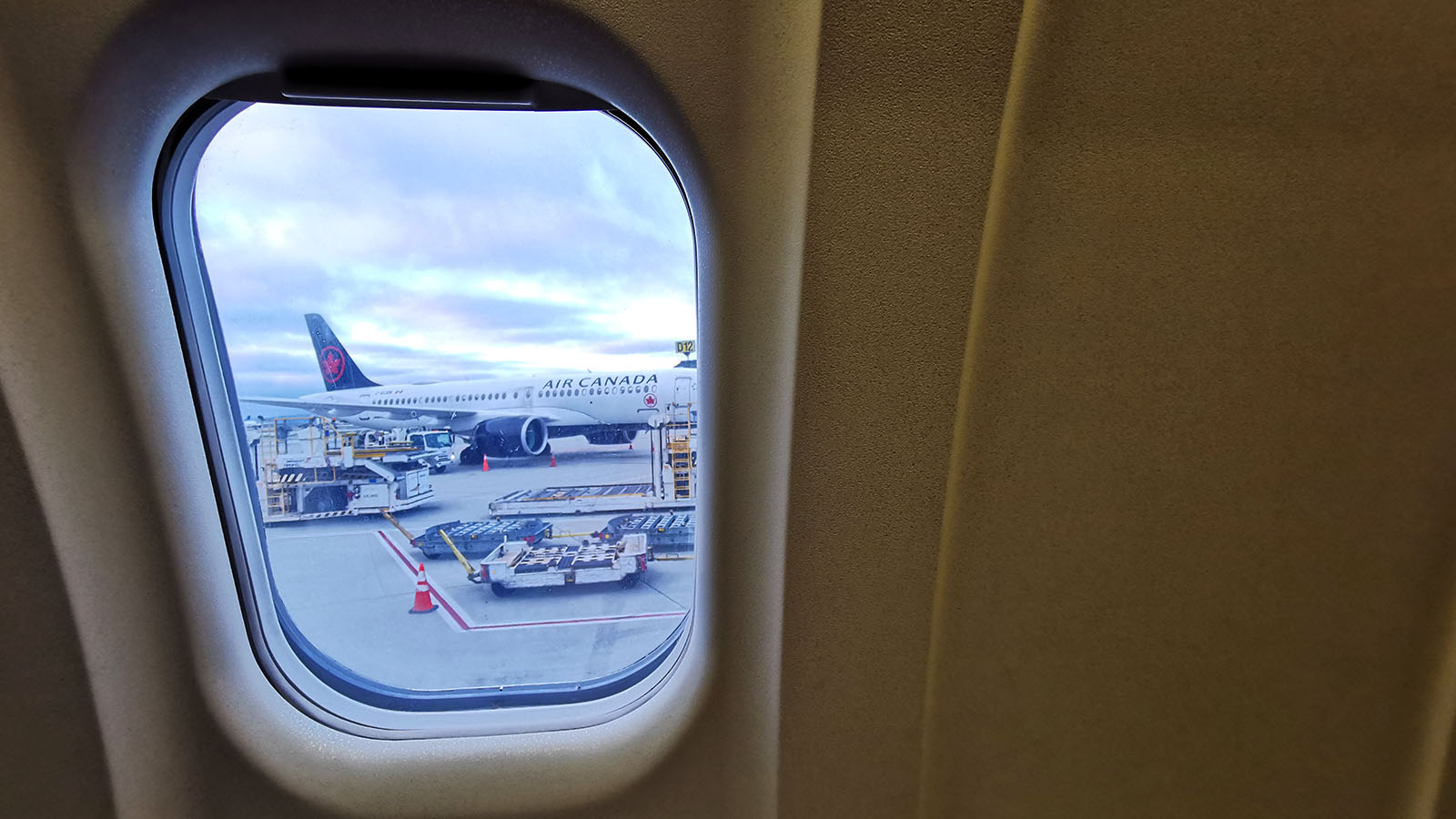 Seat by the window in Air Canada Bombardier CRJ900 Business Class