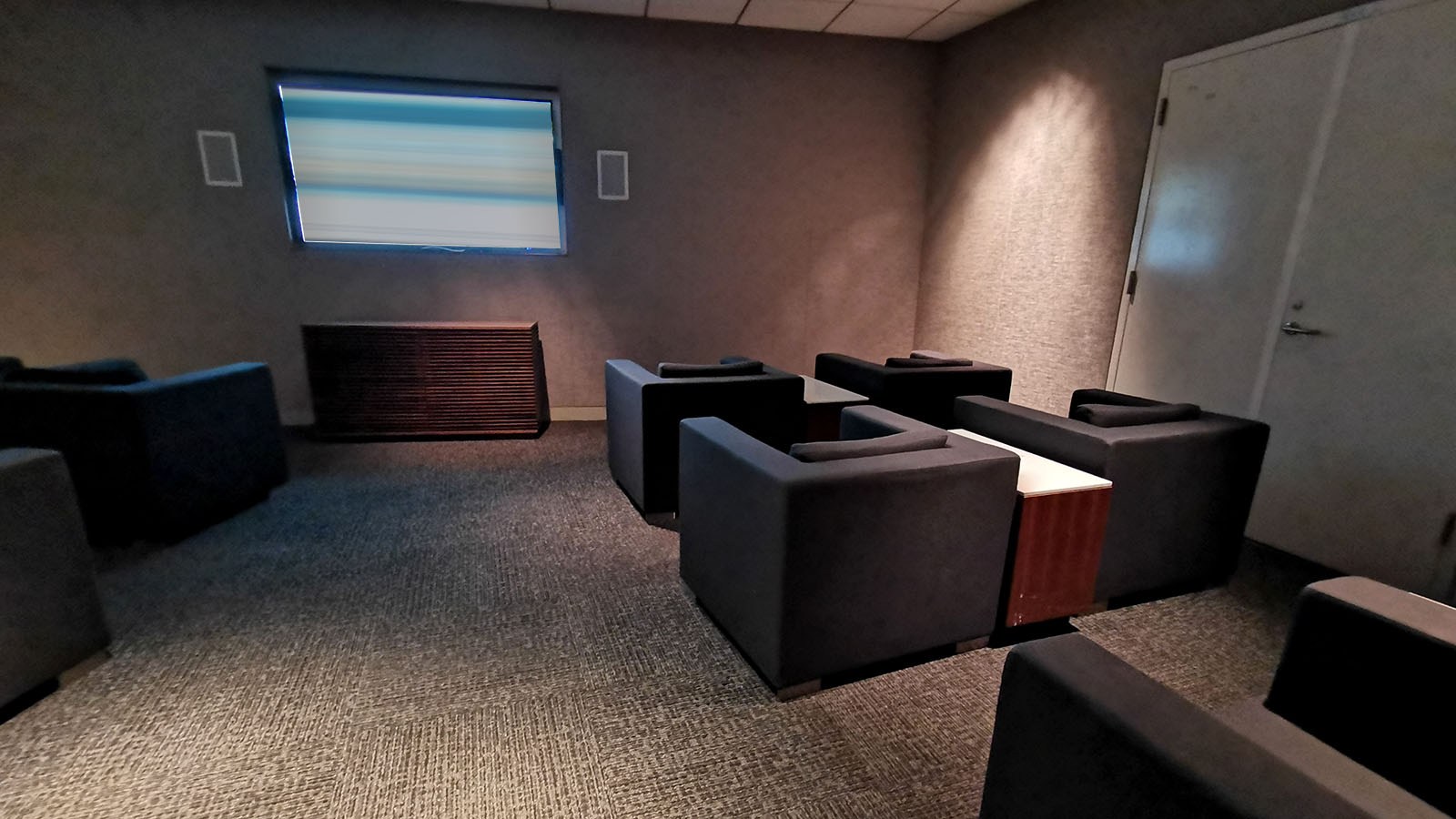 Watch a movie in the Business Class Star Alliance Lounge, Los Angeles