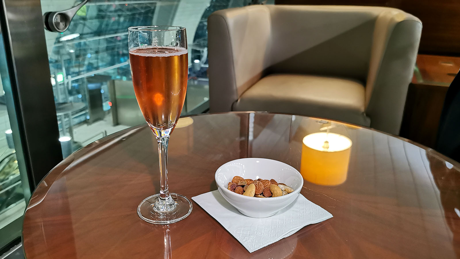 Wine with nuts in the Emirates Business Class Lounge Dubai T3, Concourse B