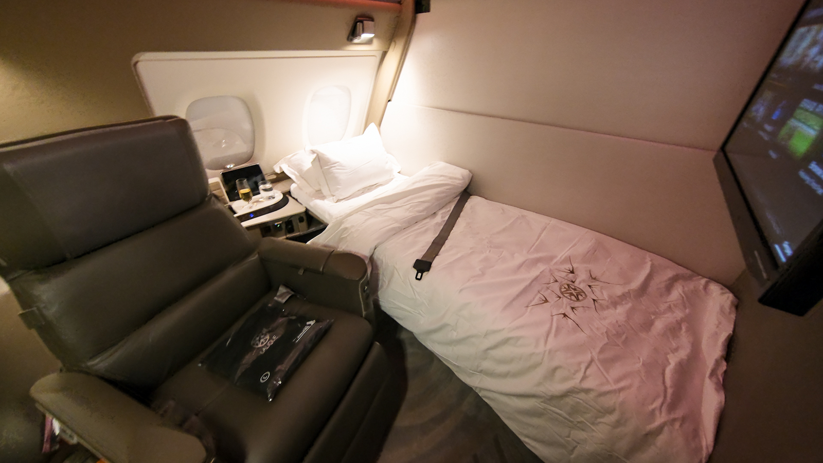 Folded down bed in Singapore Airlines First