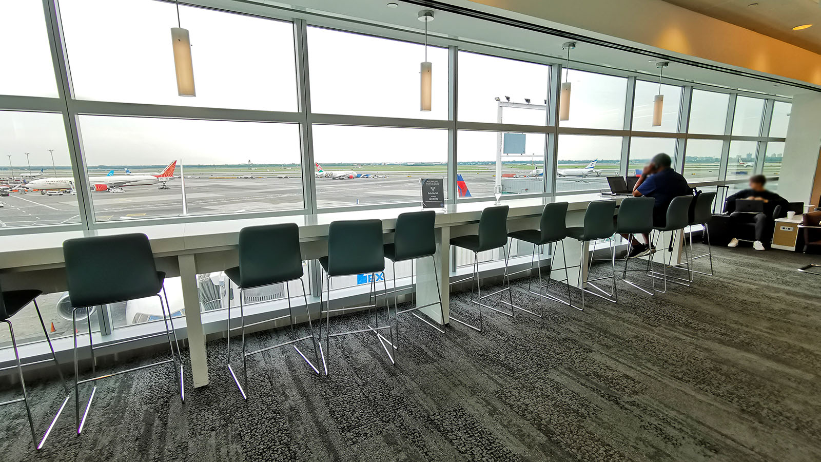 Window-side seating in the Delta Sky Club New York JFK T4B