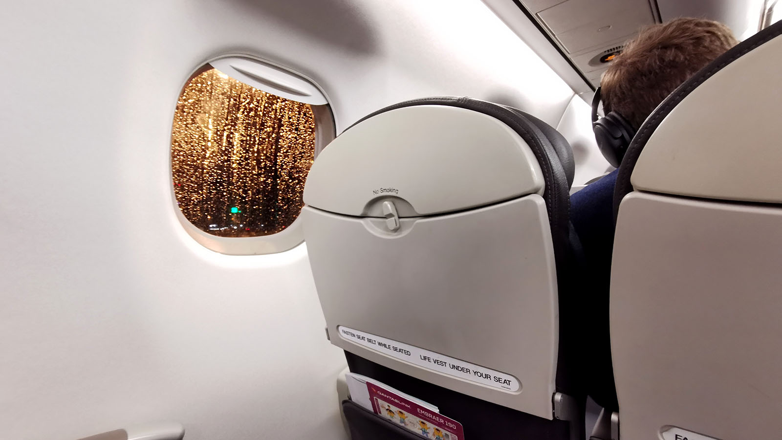 Tray table on the QantasLink Embraer E190