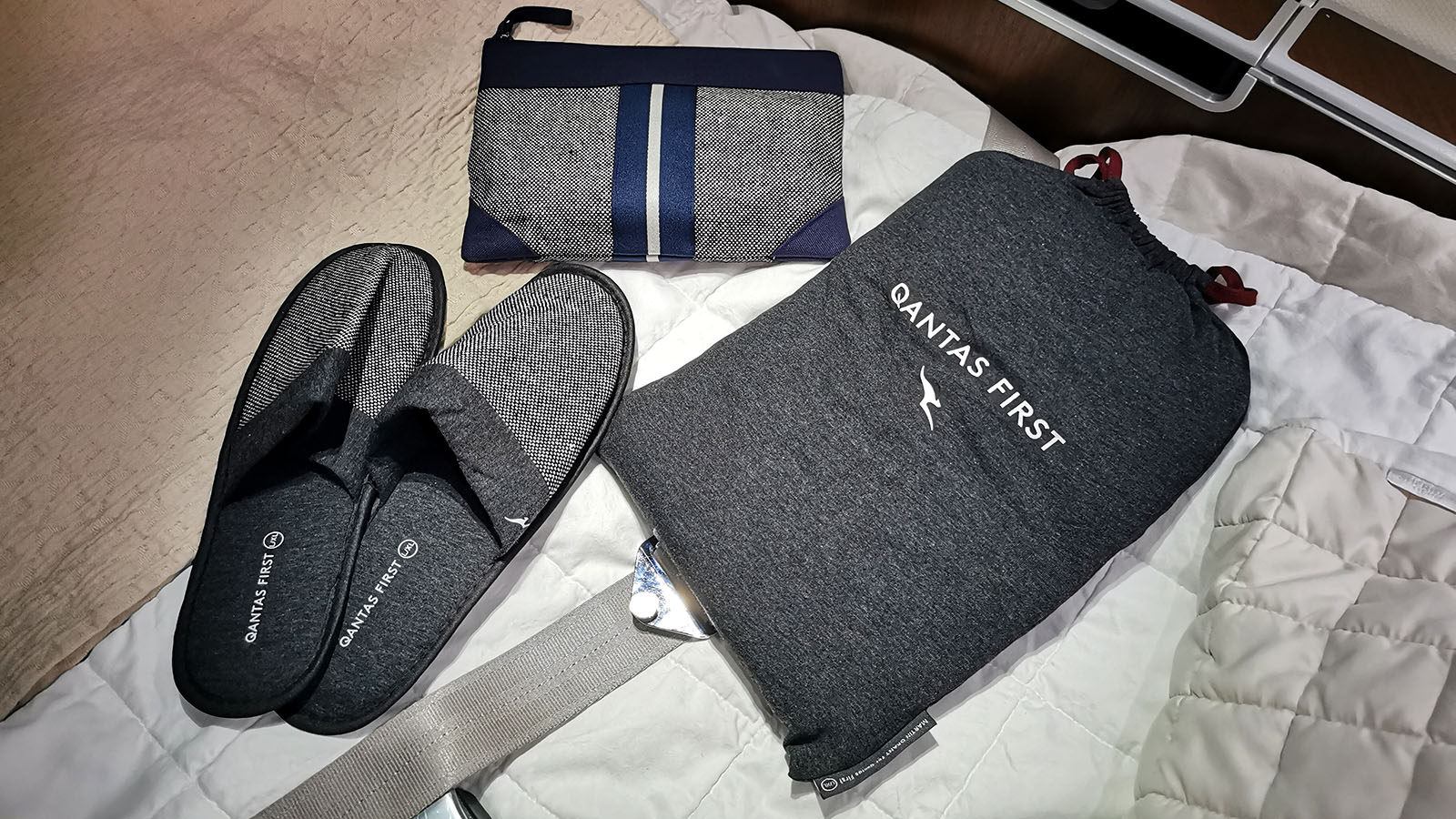 Pyjamas, slippers and amenity kit in Qantas Airbus A380 First