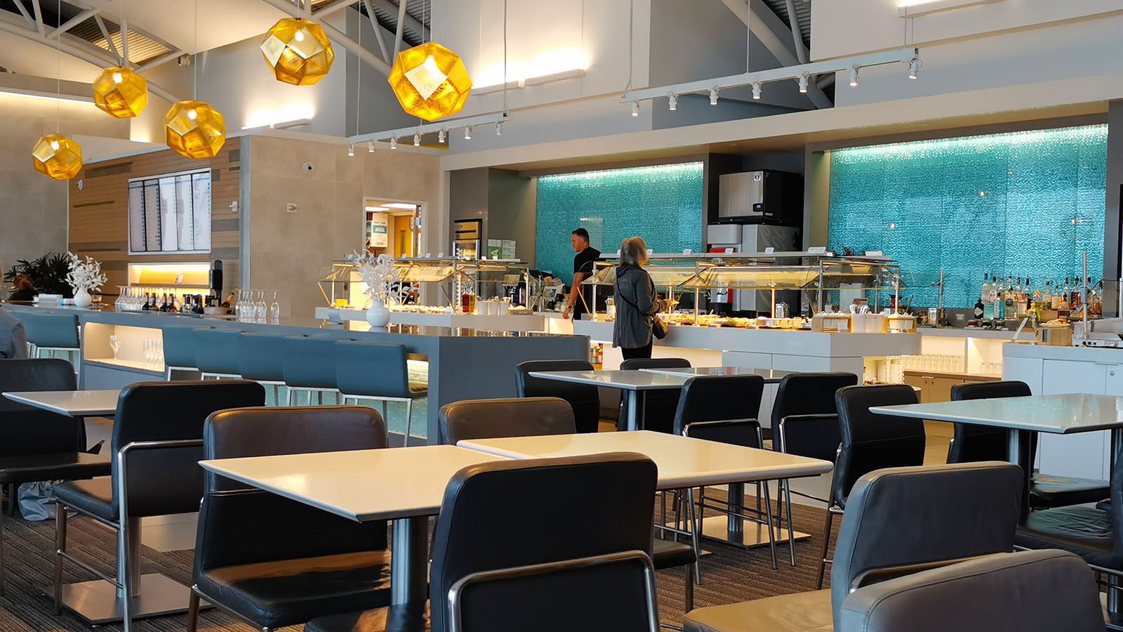 Tables and chairs in the American Airlines Flagship Lounge, Los Angeles