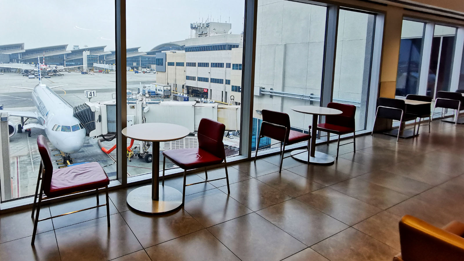 Sit and enjoy the view in the American Airlines Flagship Lounge, Los Angeles