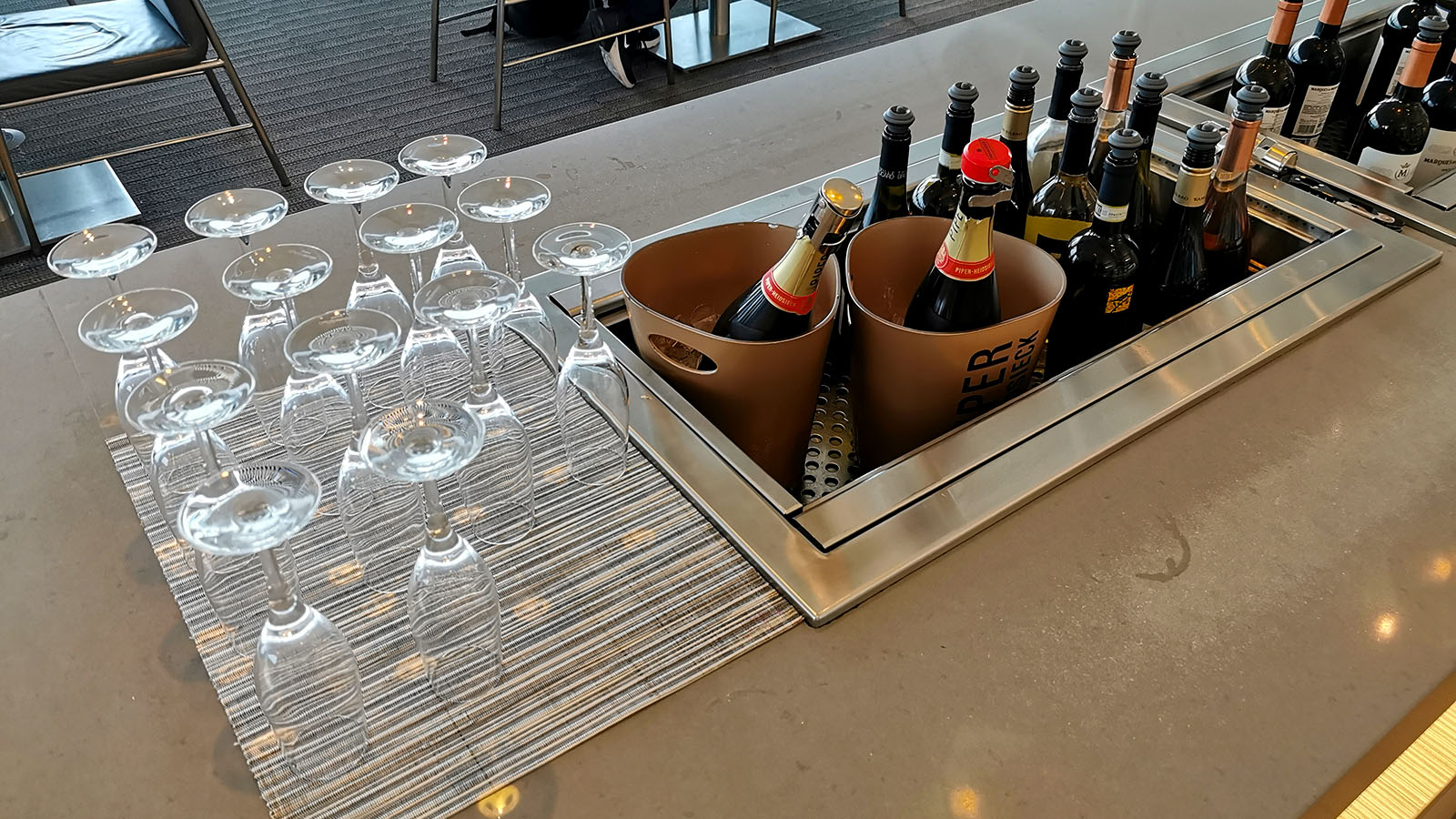 Glasses and wine in the American Airlines Flagship Lounge, Los Angeles