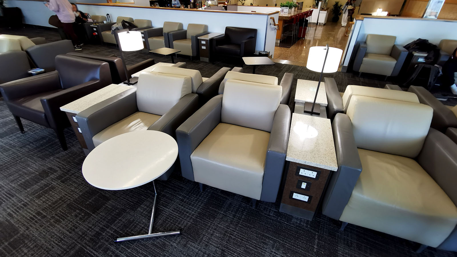 Personal sofas in the American Airlines International First Class Lounge, London Heathrow