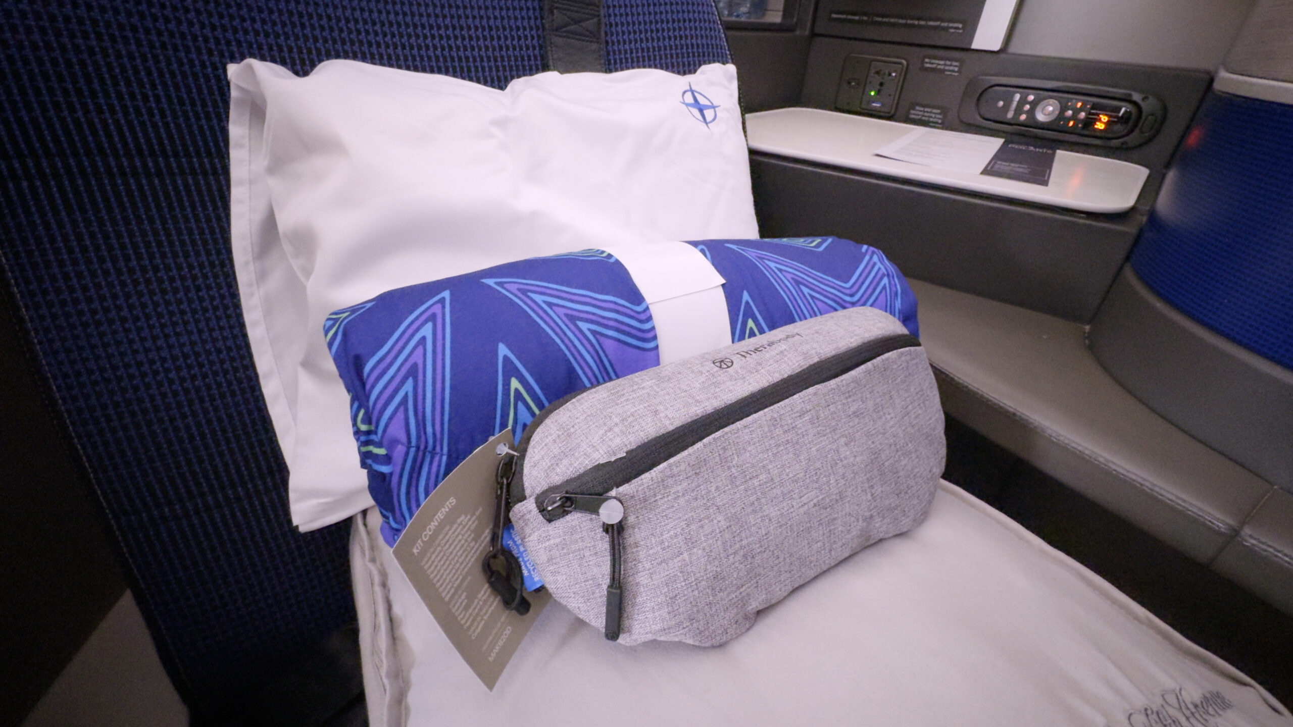 United Airlines Polaris Business Class Seat with amenities