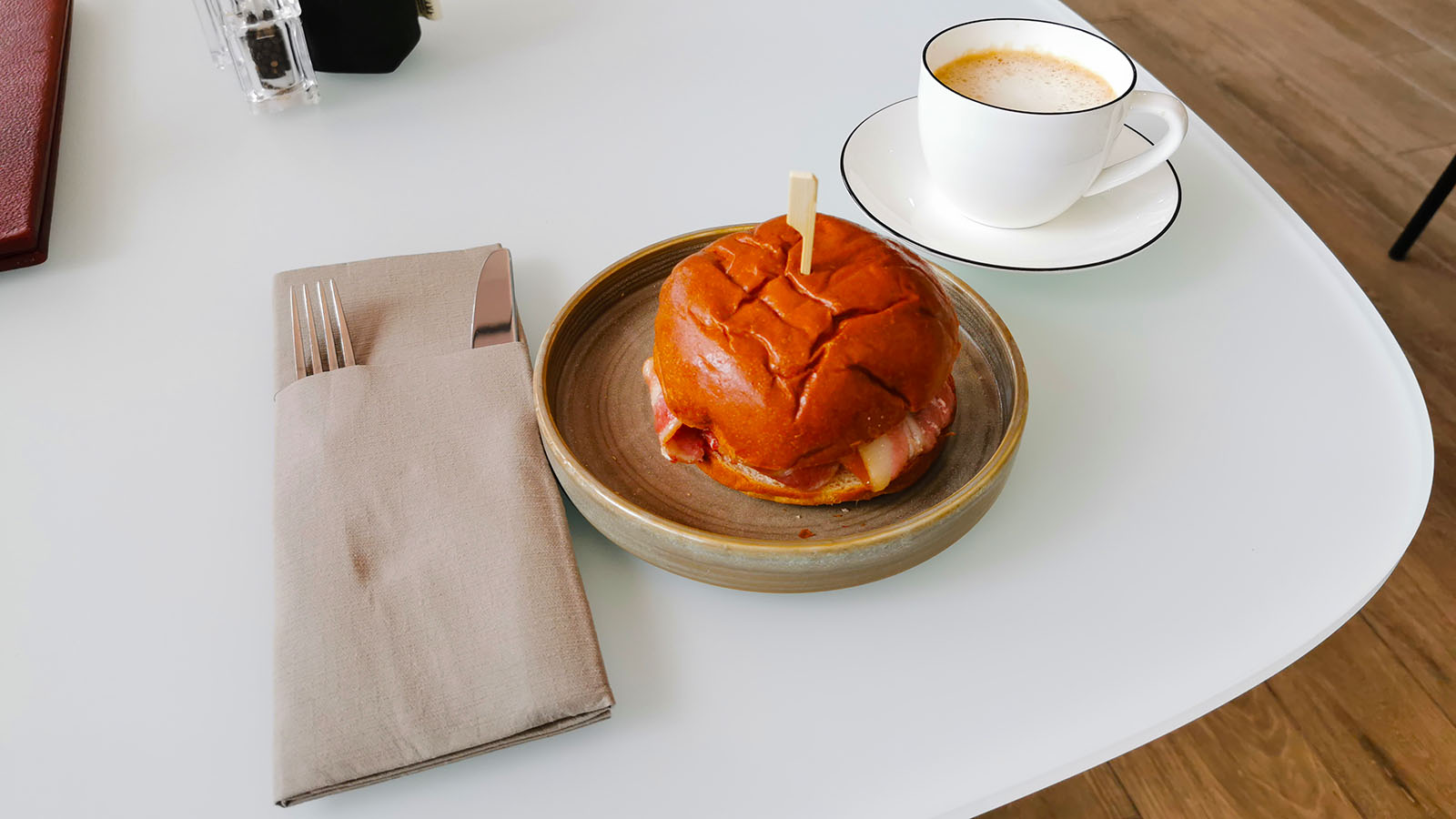 Bacon roll in the American Airlines Arrivals Lounge at London Heathrow