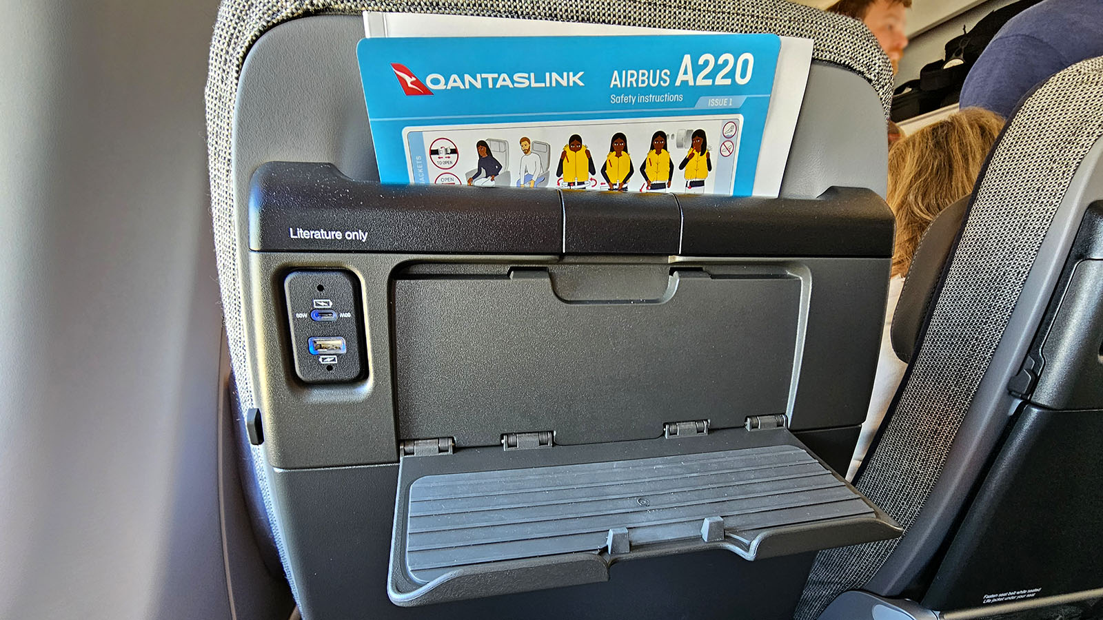 Device holder in QantasLink Airbus A220 Economy