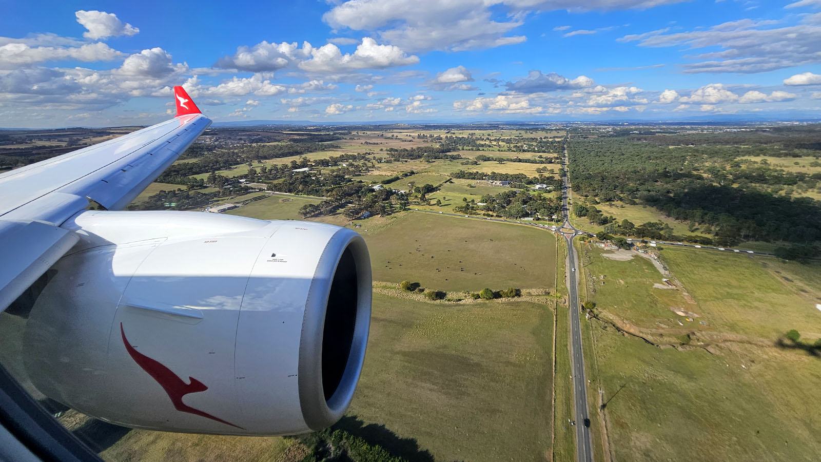 Wing from QantasLink Airbus A220 Economy