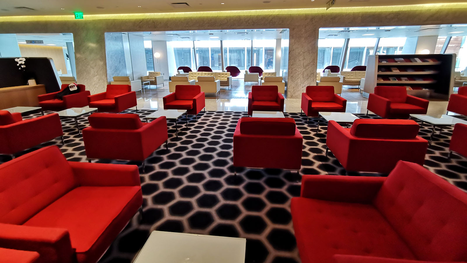 Red chairs in the Qantas International First Lounge, Los Angeles