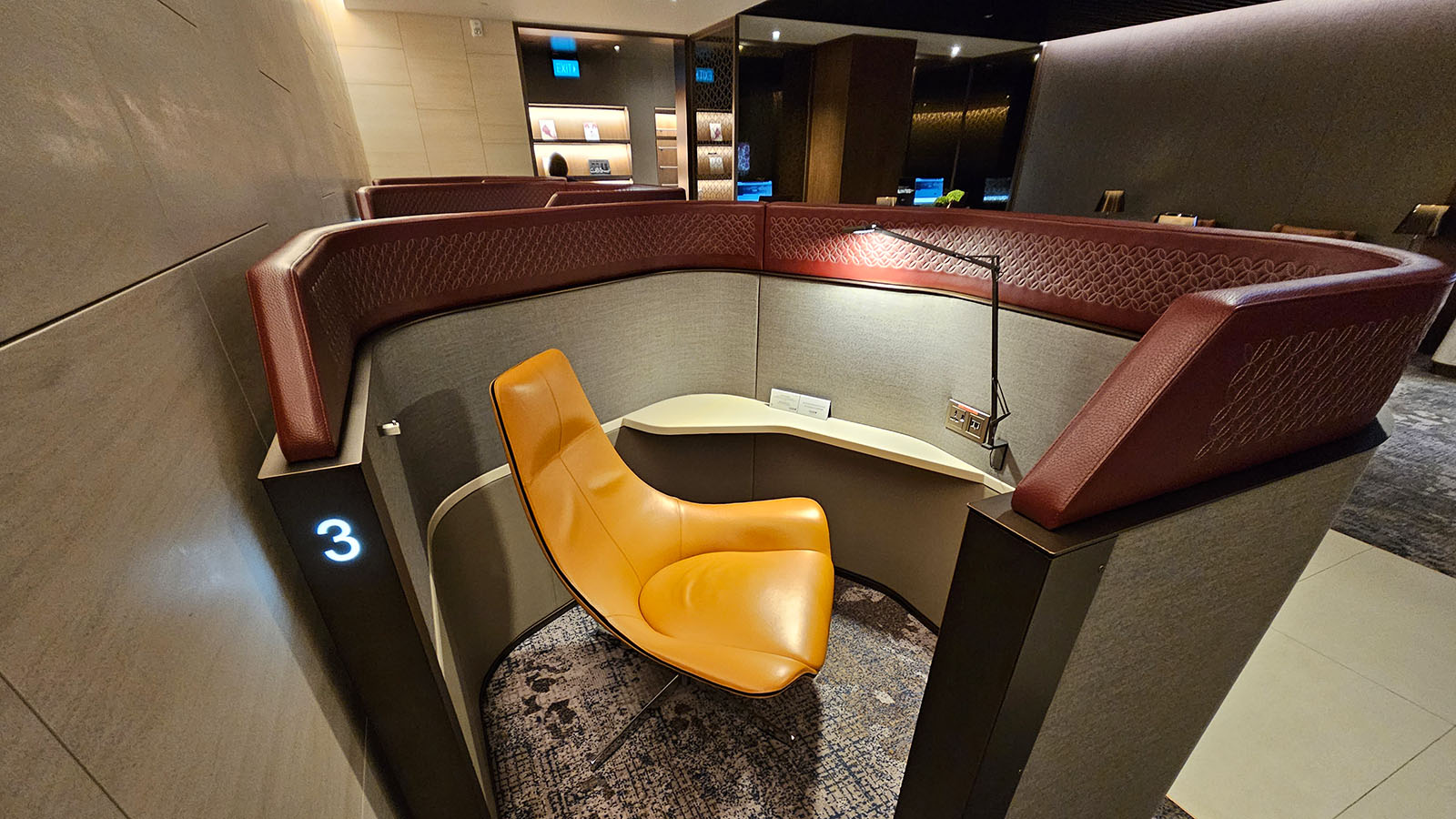 Private seating in the Qatar Airways Premium Lounge, Singapore