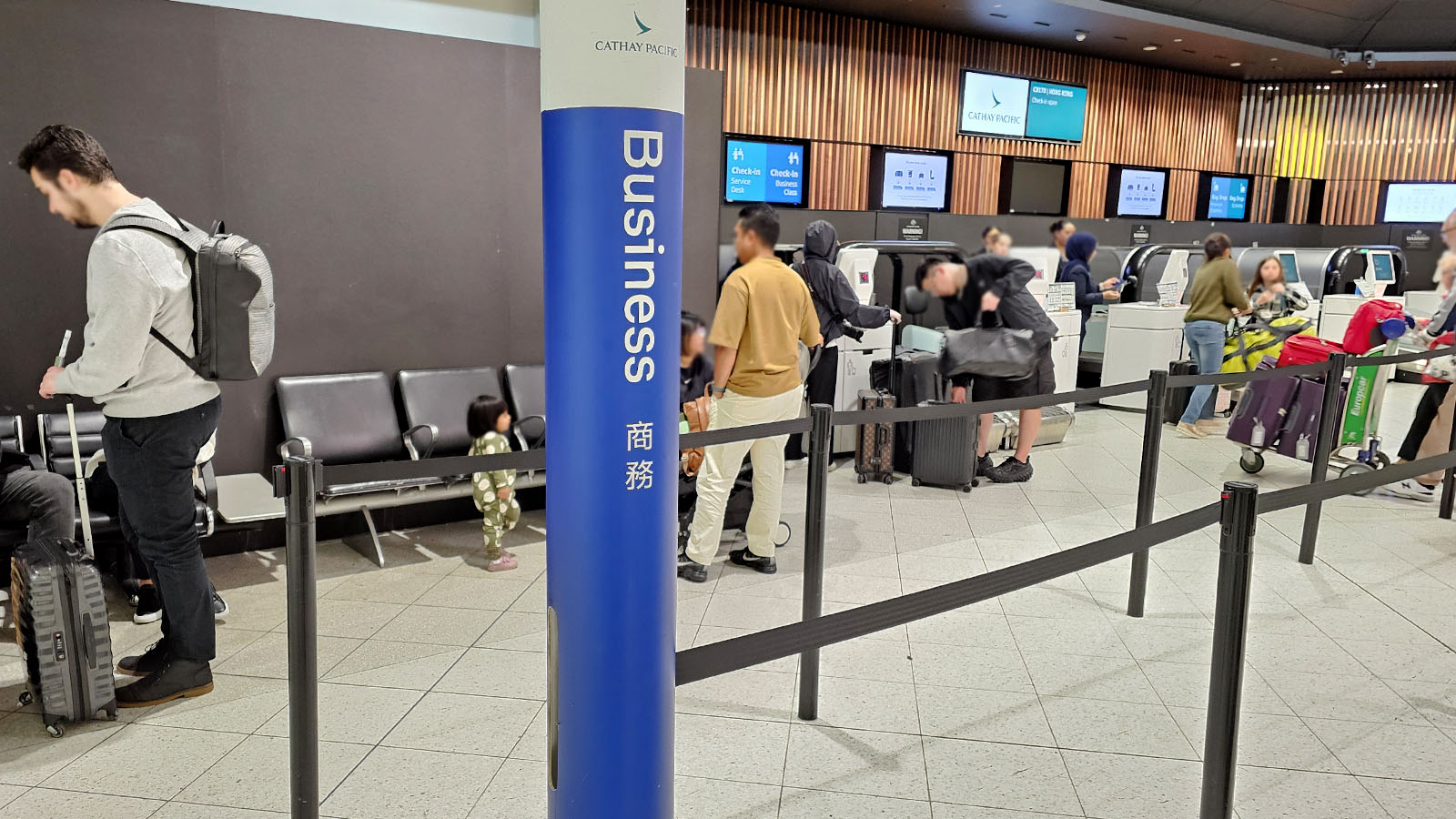 Airport check-in for Cathay Pacific flight