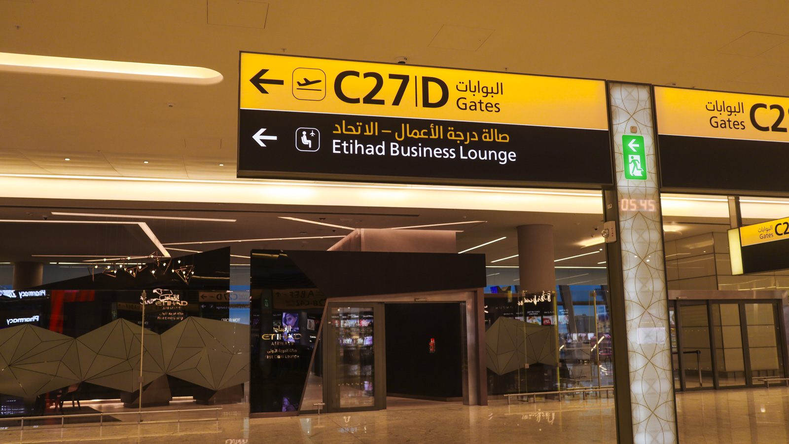 Etihad Business Class lounge signage at Abu Dhabi airport