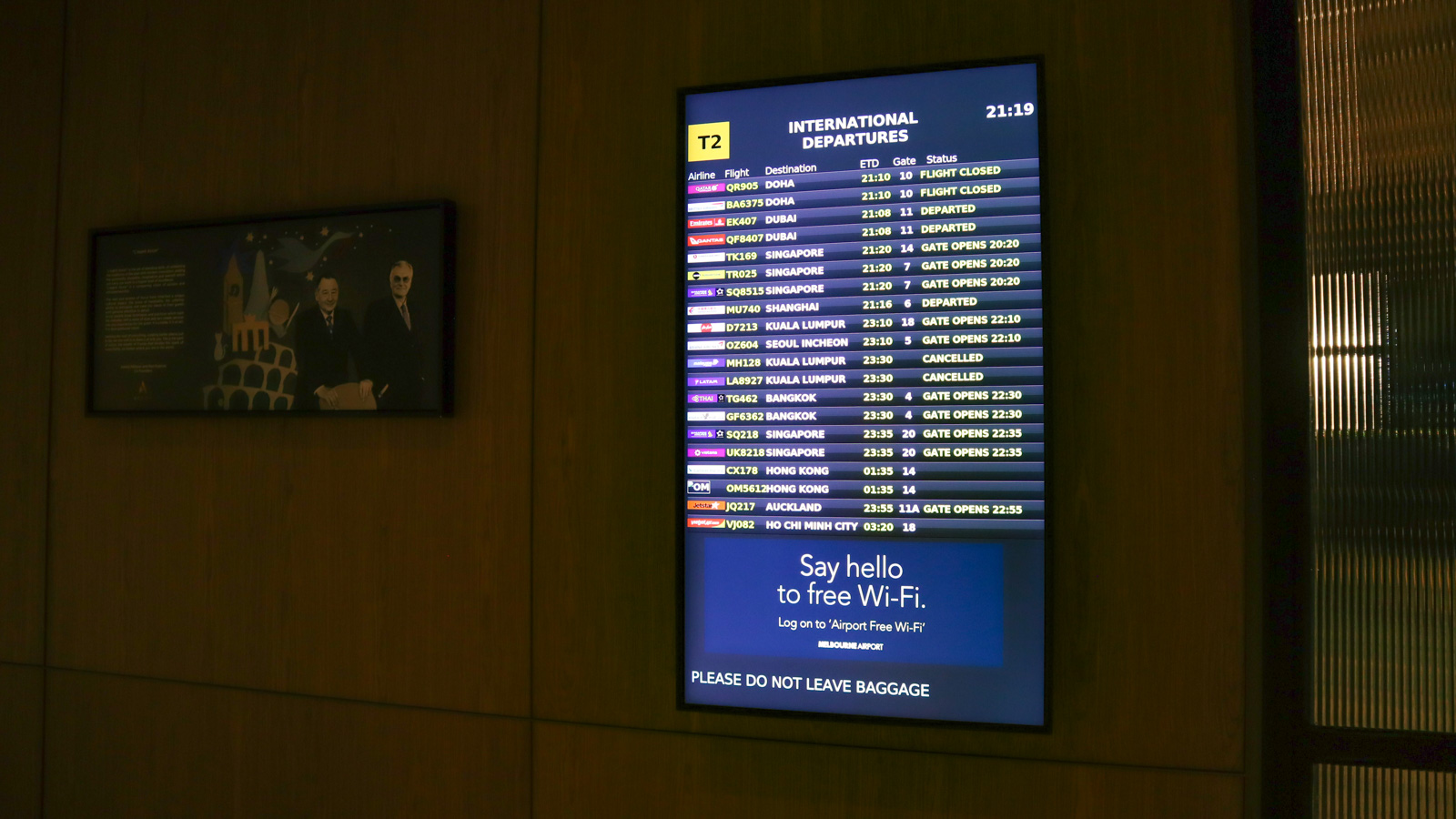 Departures board at Novotel Melbourne Airport hotel lobby