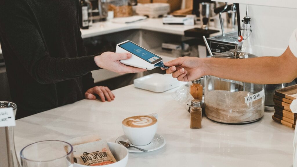 Paying for coffee with card | Clay Banks, Unsplash