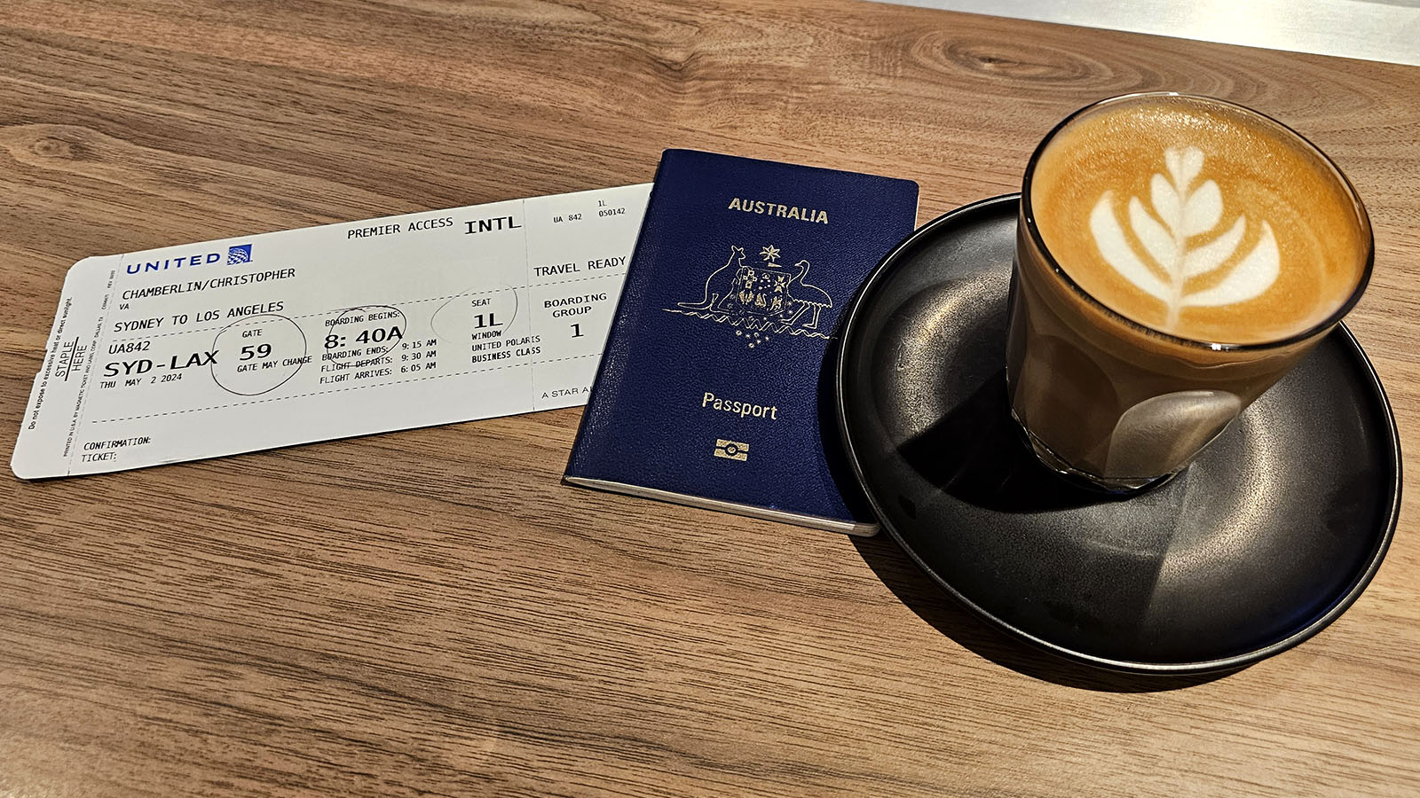 United boarding pass and latte