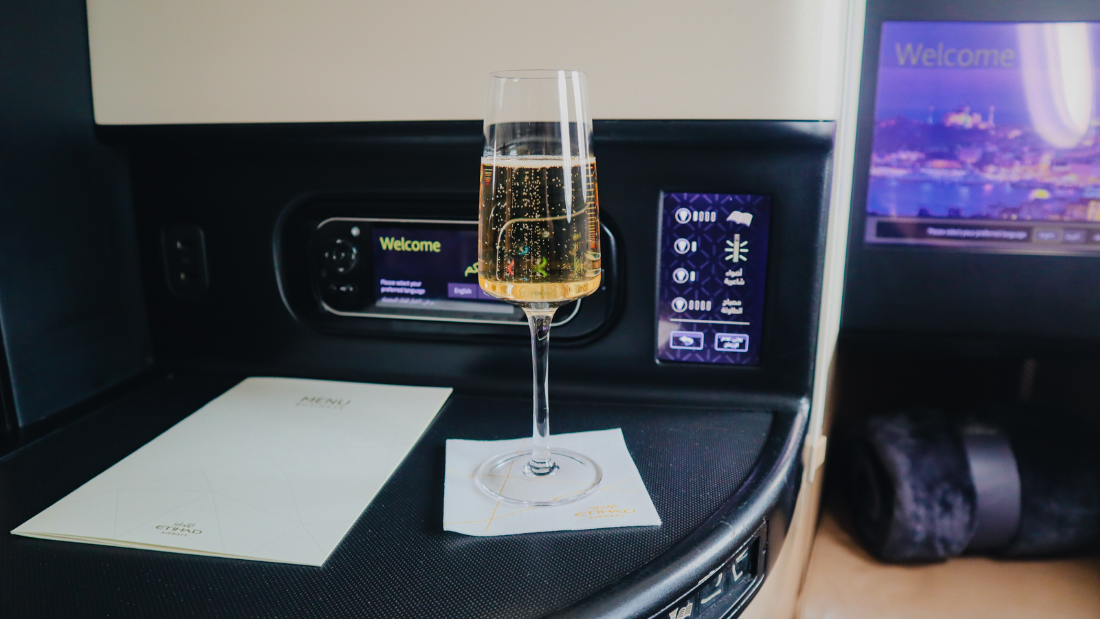 Pre-departure drink on Etihad Boeing 787 Business Class