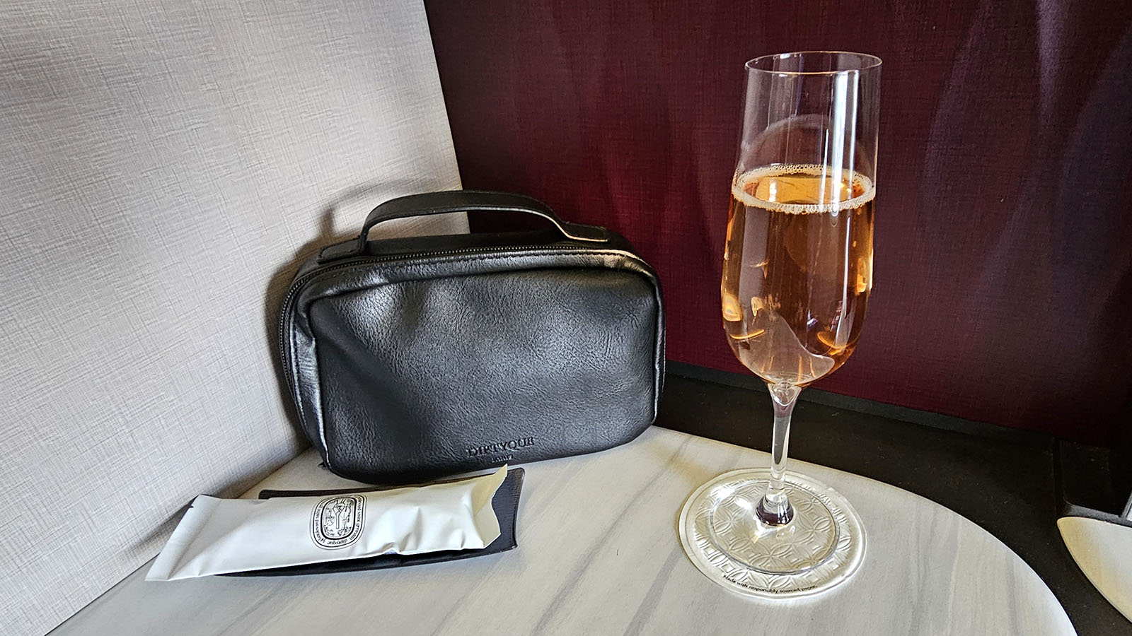 Bubbles in Virgin Australia Qsuite