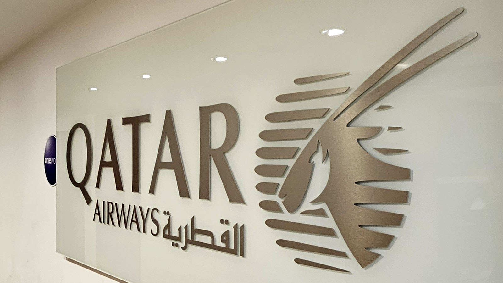 Logo outside the Qatar Airways Premium Lounge, Paris - Point Hacks, by Chris Chamberlin